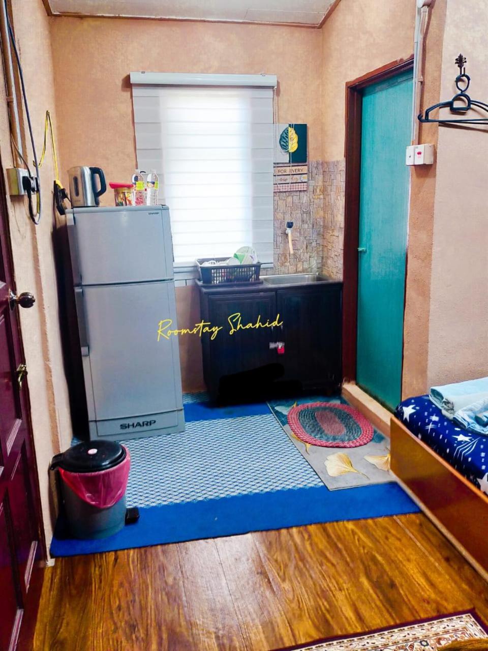 Roomstay Shahid Hou'Ze Кангар Экстерьер фото