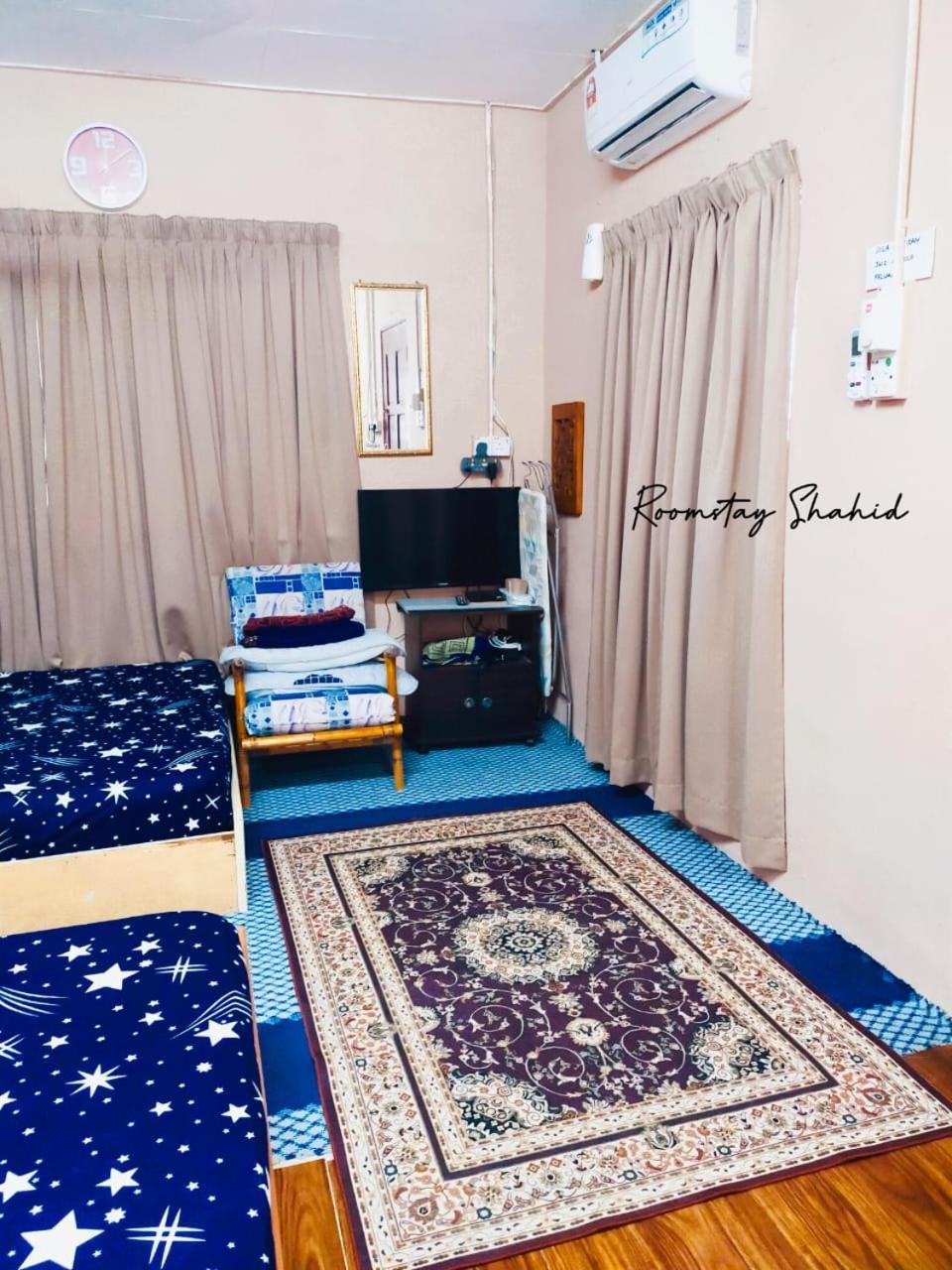 Roomstay Shahid Hou'Ze Кангар Экстерьер фото